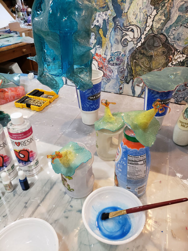 mixing color with art resin for the lantern