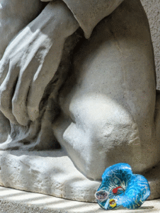 One of Margaret Craig's Setting Seed sculptures rests at the base of Charles Umlauf's War Mother (1939) at the McNay Art Museum in San Antonio.